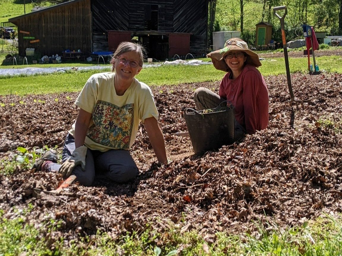 Women gardening at Yancey Community Garden